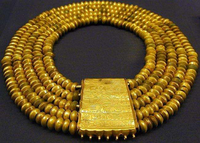 Beaded African gold necklaces blend tradition with modern elegance.